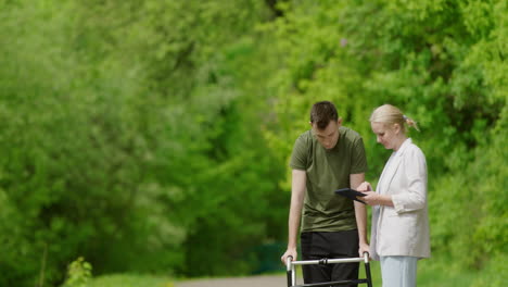 person using walker being assisted by a professional