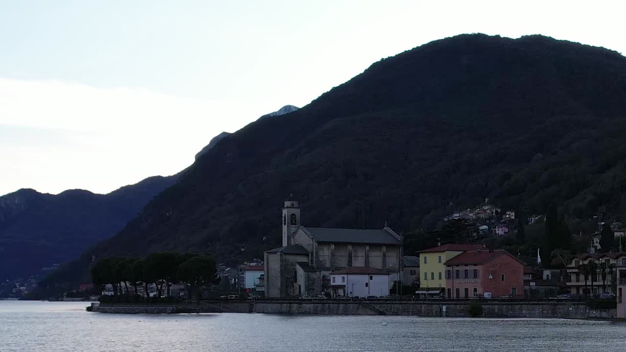 Discover beautiful Italian village by the Alps with stunning drone view