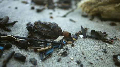 detail-shot-of-sand-and-plastics