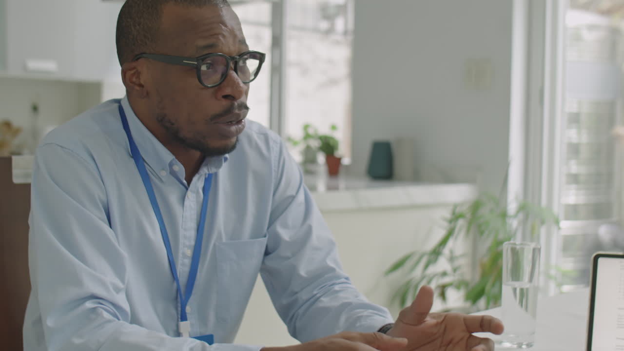 Sales Representative Talking to Couple on Meeting at Home