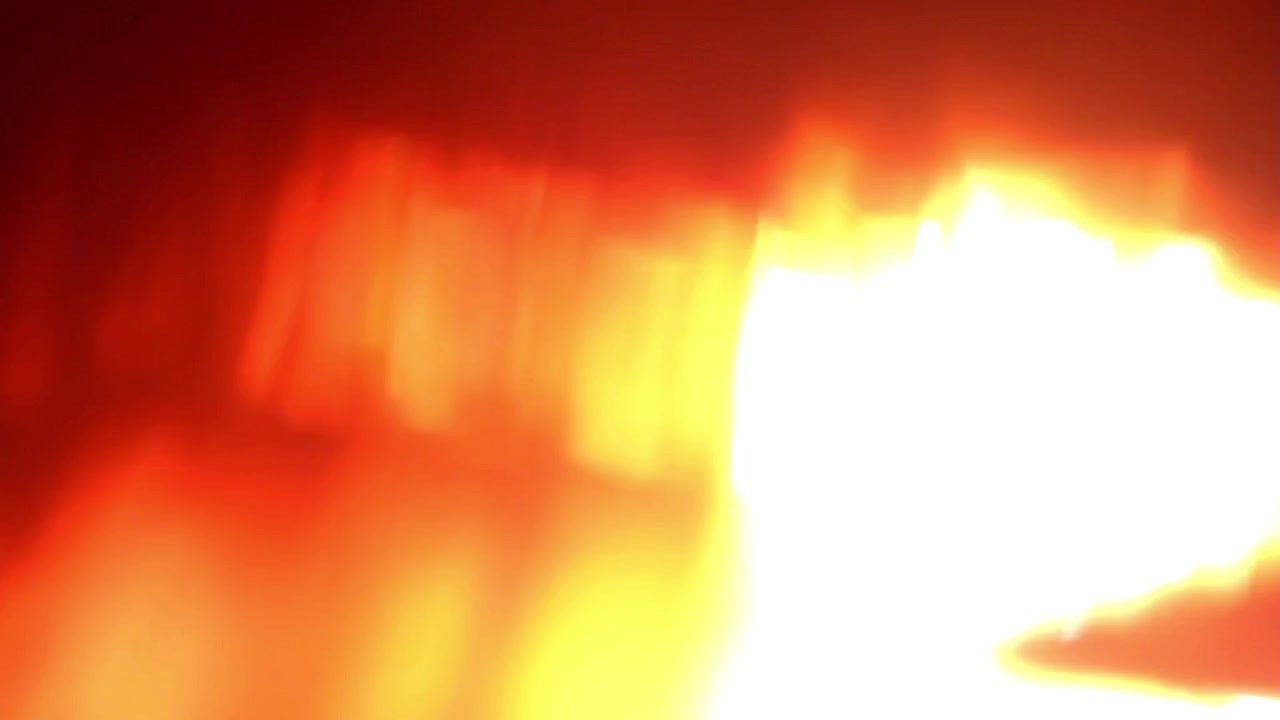 Effetto di Transizione con Perdita di Luce Arancione Caldo e Giallo