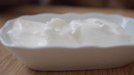 close-up of a bowl of white yogurt