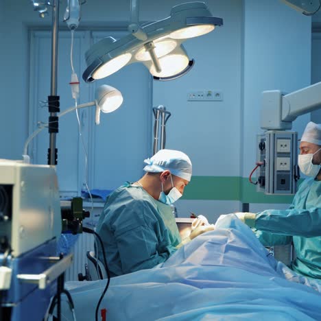 plastic surgery in modern clinic. professional doctors doing blepharoplasty on a patient's face. facial correction against aging.