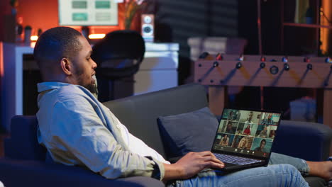 vertical video confident male speaker greeting coworkers on a web video conference meeting