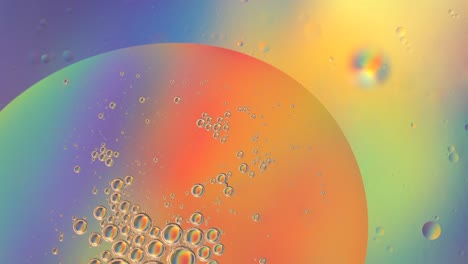 oil bubbles in water macro. cosmetic product. neon purple pink ultraviolet and blue gradient background