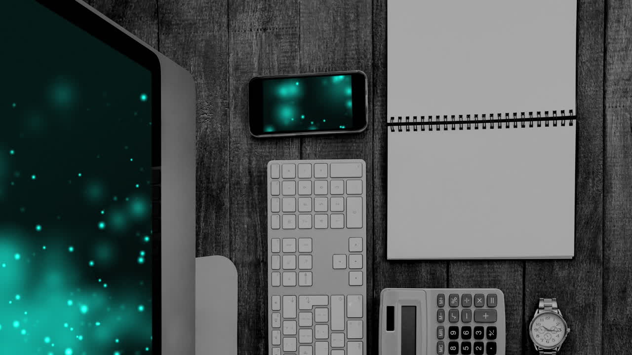 테이블 위의 화면에 빛의 반점이있는 기술 장치의 애니메이션