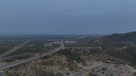 aerial-shot-of-drone-flying-above-the-clouds-on-a-cloudy-day