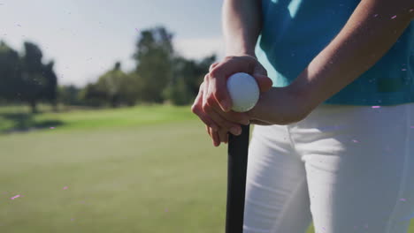 woman practicing golf stroke on fairway, with motion icons showing swing metrics for education