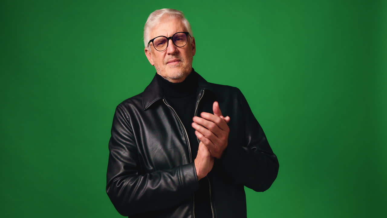 Portrait of a middle-aged man in a black jacket