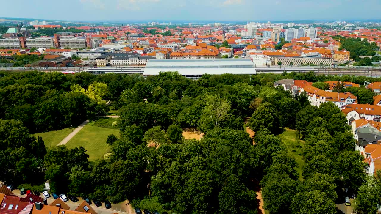 4K Aerial Drone Video of the City Park next to the Train Station in Downtown Erfurt, Germany