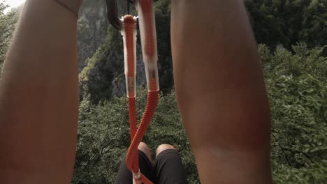 point of view slacklining on a valley