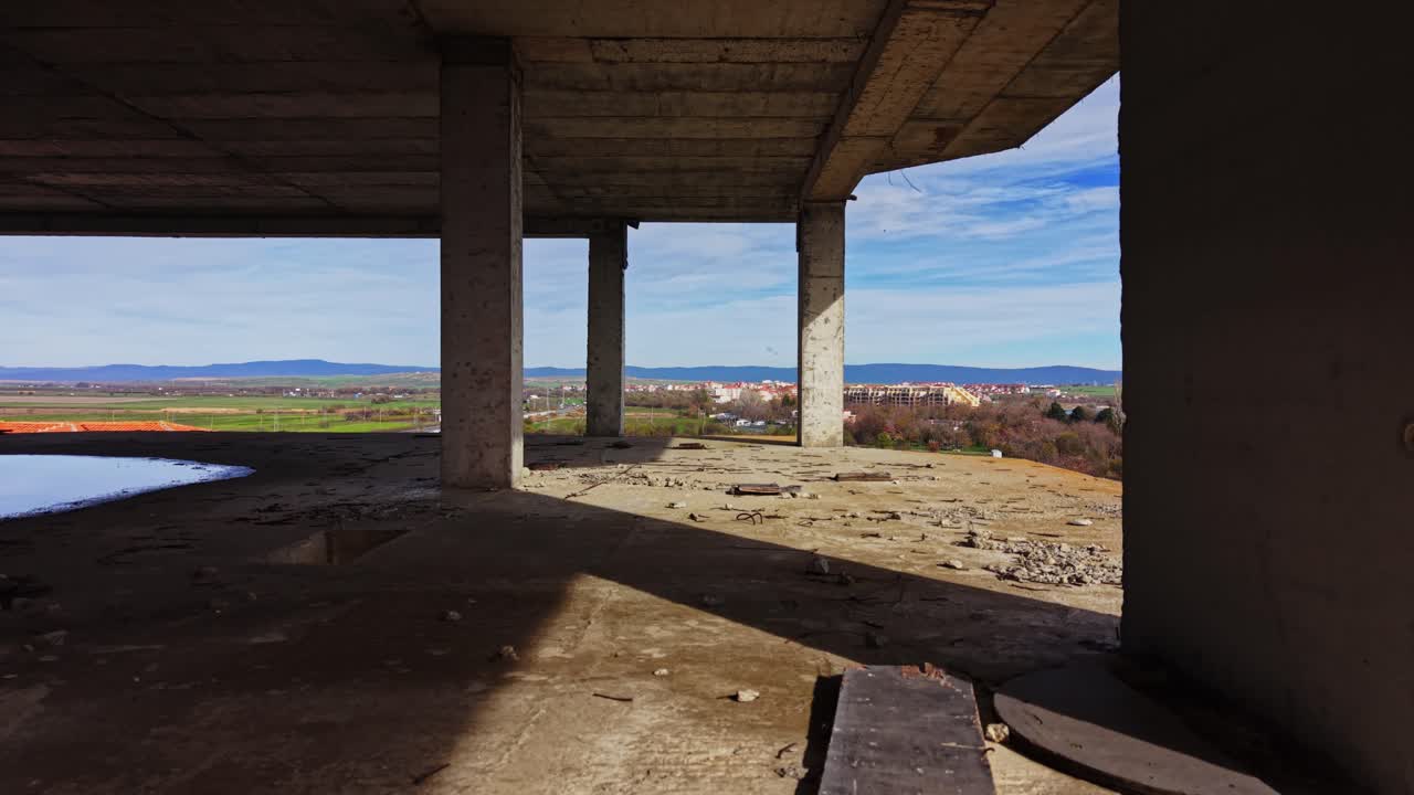 View from an abandoned building overlooking a riverside town