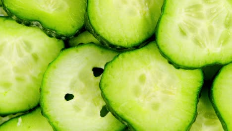 sliced cucumber rotating round and round. fresh sliced cucumber rotation