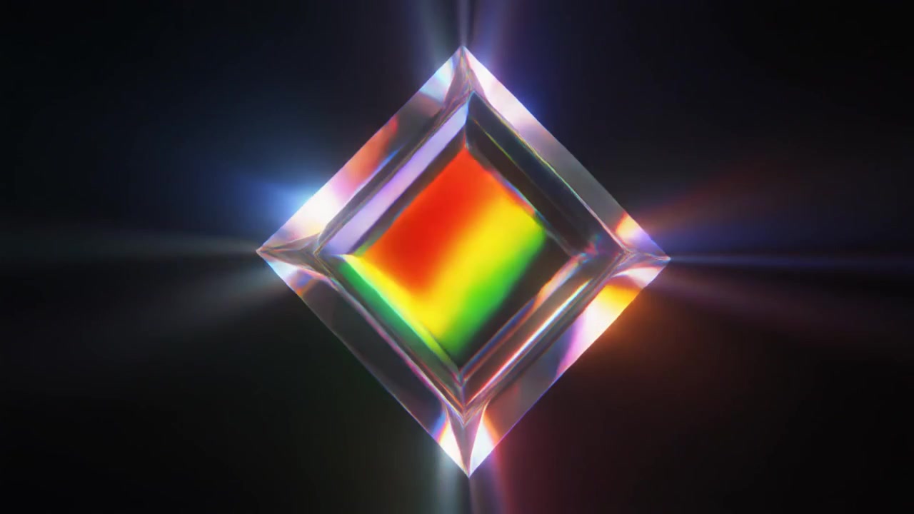 Cubo di vetro rotante con rifrazione di luce prismatica