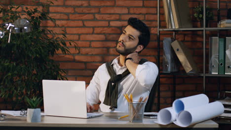 Young-Arabian-Architect-Working-With-Laptop