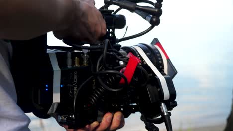 professional cinematographer operating a camera