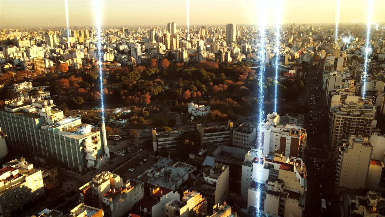 vuelo aéreo del concepto futuro con líneas digitales brillantes que conectan la ciudad - hermoso parque natural con árboles rodeados de edificios y rascacielos de buenos aires durante la puesta de sol - prores