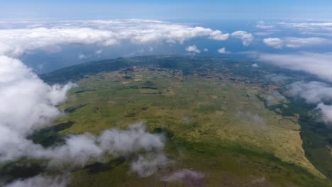 Flying-high-bove-the-clouds-on-the-island-of-Pico-in-the-Azores,-Portugal