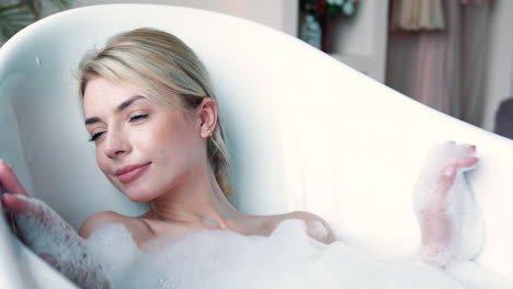 woman relaxing in a bubble bath