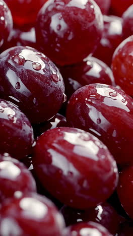 fresh red grapes with water droplets