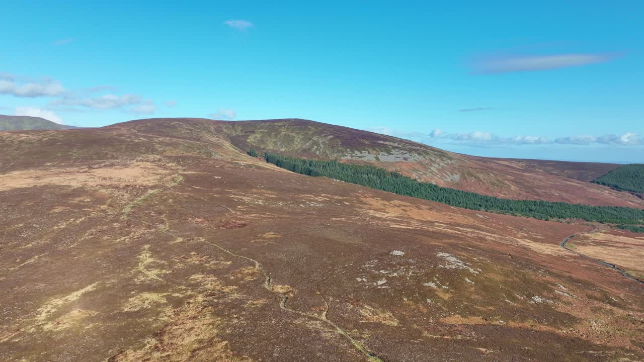 Epic Ireland uplands drone rising winter heather and bogland Comeragh Mountains Waterford