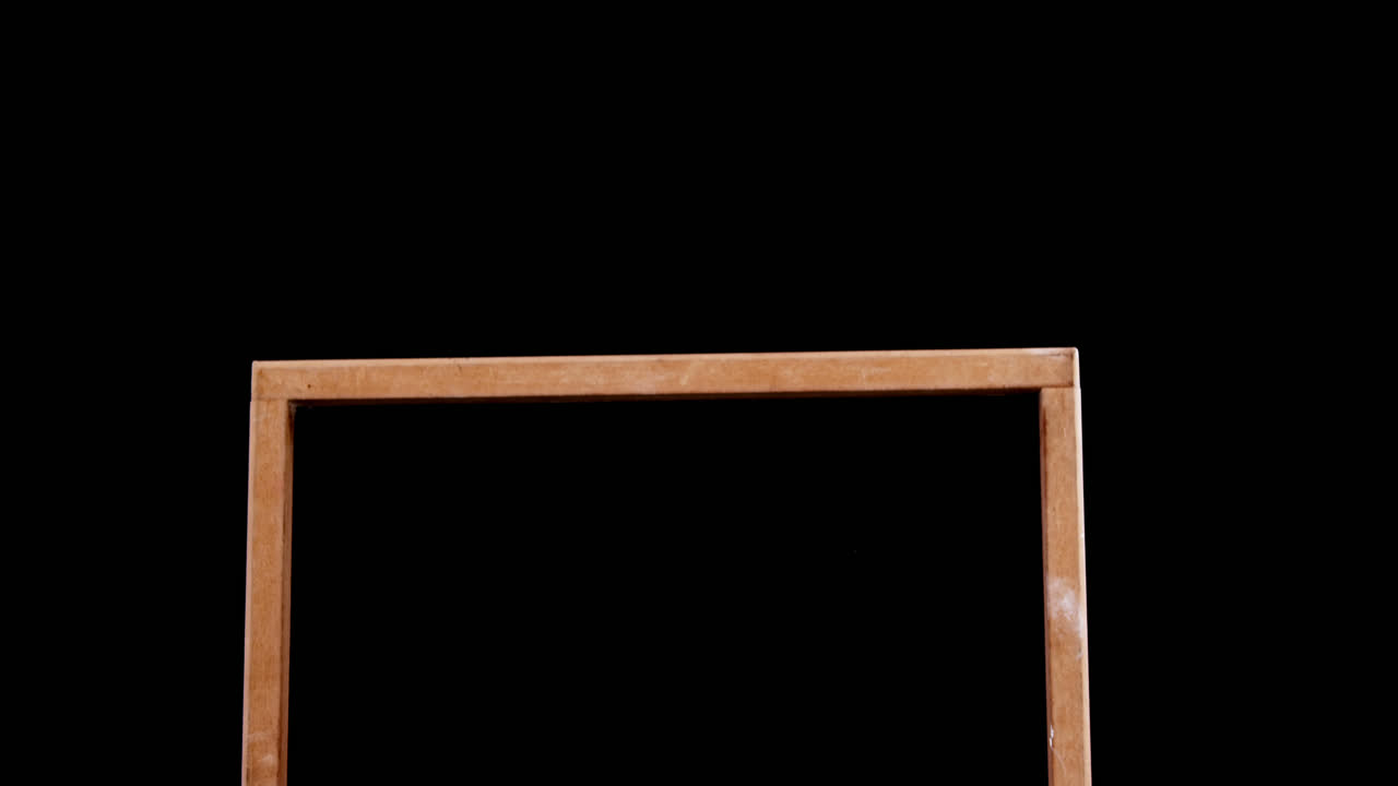 Blank slate and chalk on table