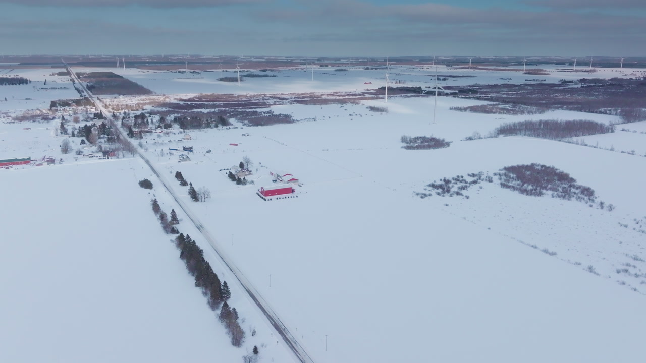 Winter aerial view of wind turbines in snowy Shelburne, Ontario