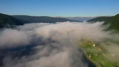 aerial footage beautiful nature norway over the clouds.