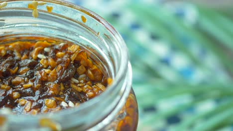 close-up of a jar of chili sauce