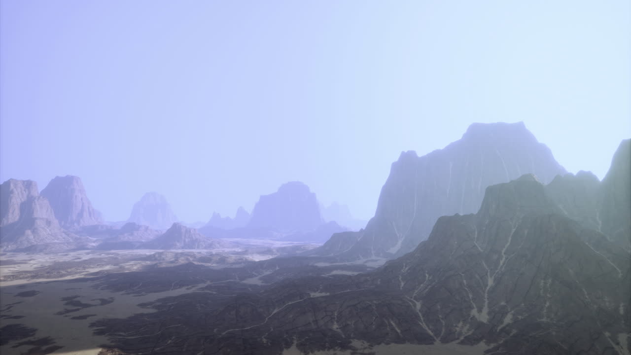 Vast mountain landscape under a misty sky in a serene desert environment