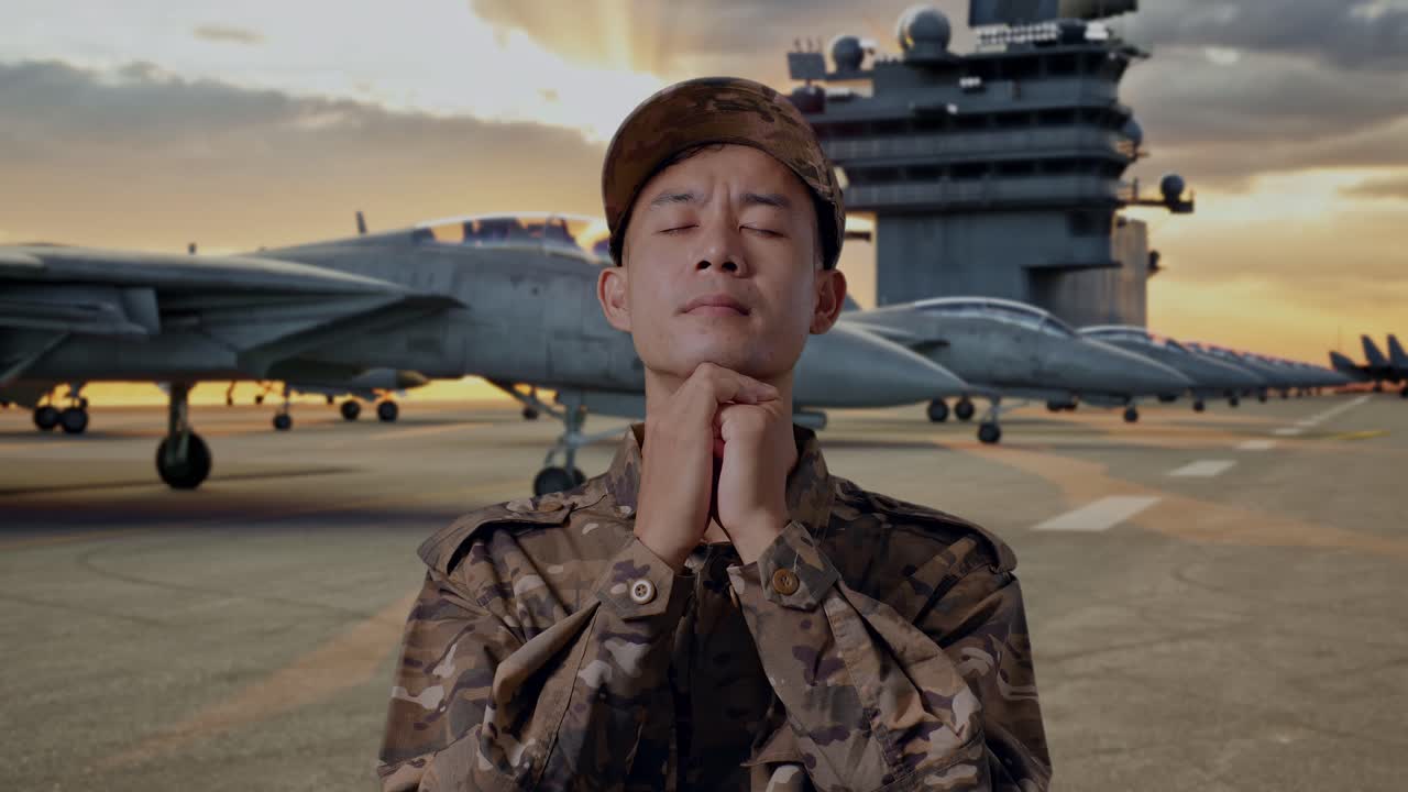 Military Personnel Praying on Aircraft Carrier