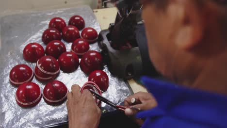 mixed race man working in factory