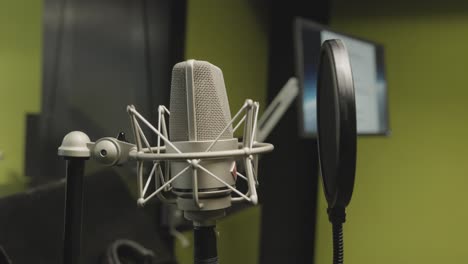 professional microphone in local studio, close up orbit view