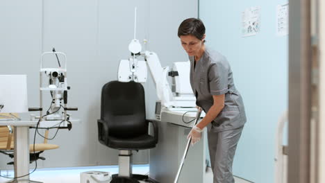 female cleaner mopping the floor