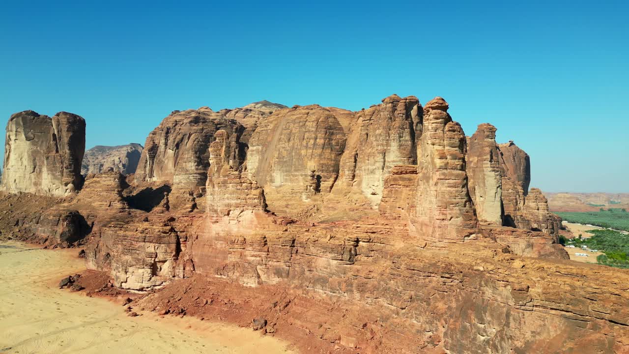 Drone shot natural sandstone rocks in AlUla desert in Saudi Arabia