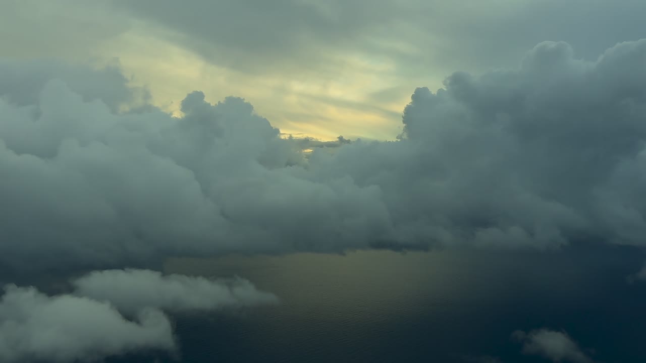 An immersive hyperlapse captured from a jet cockpit during the approach to Palma de Mallorca’s airport, flying over the Mediterranean Sea surrounded by storm clouds, and the sunrise light at the back