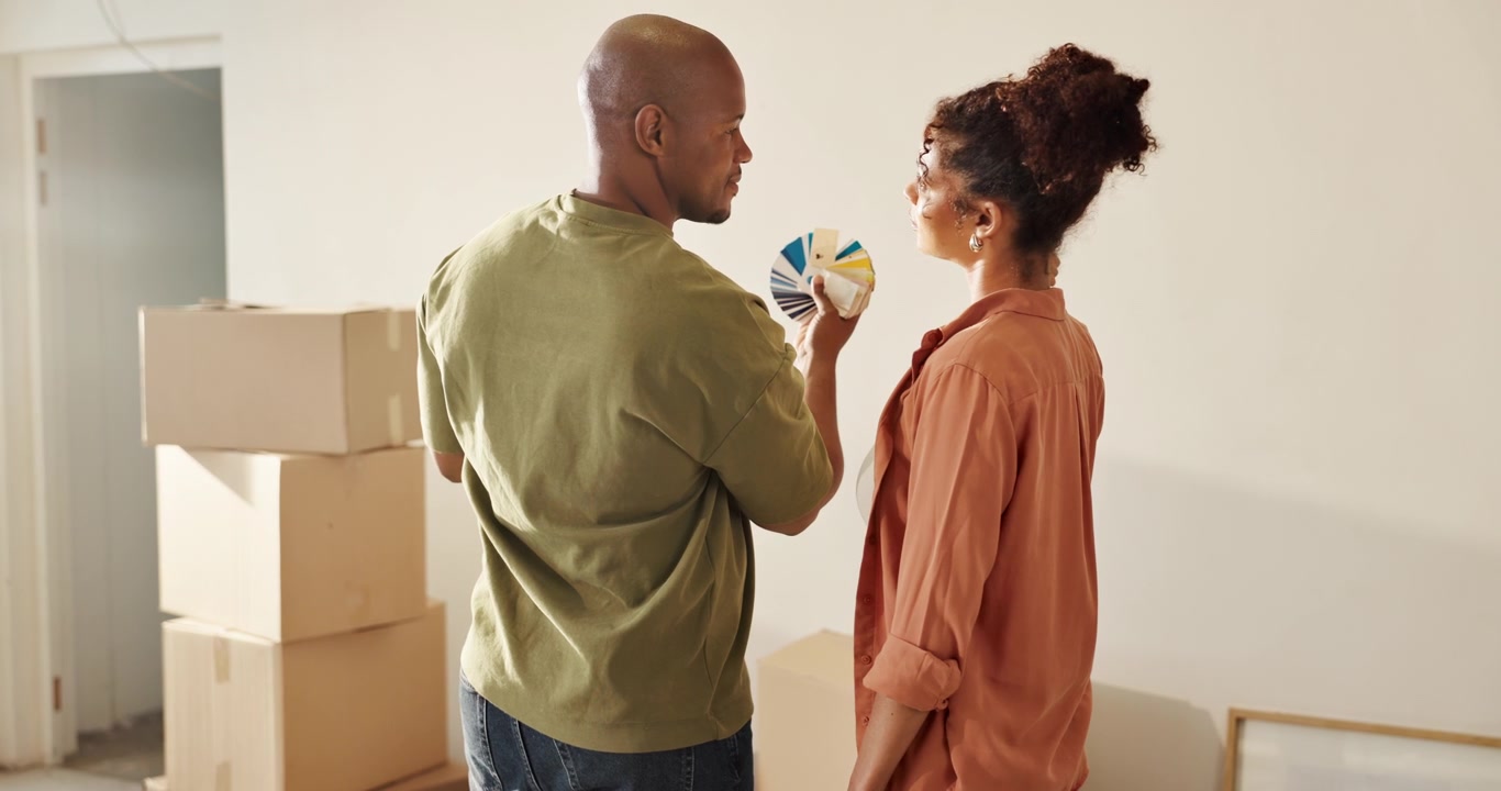 Couple Choosing Paint Colors for Their New Home