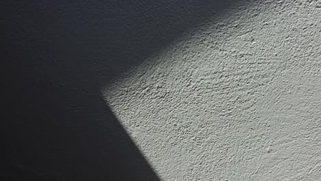 shadow on white plaster wall time lapse video