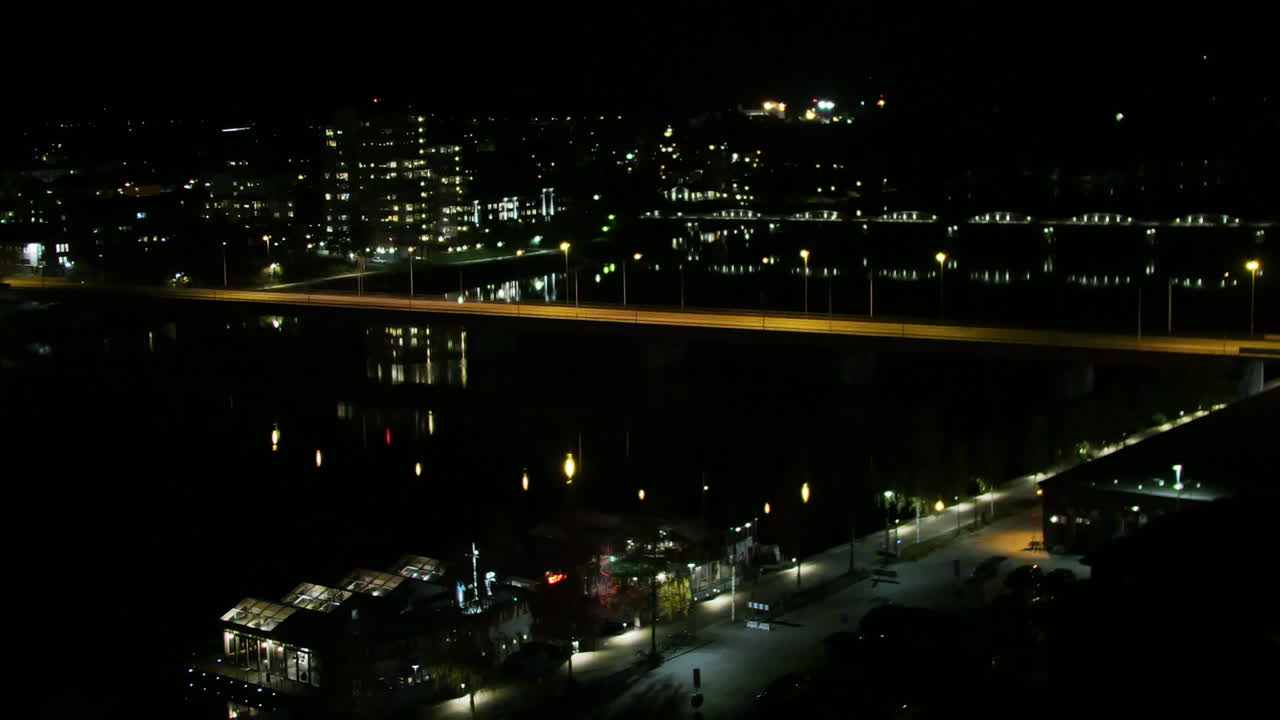 Night time lapse of Tegsbron in downtown Ume&aring;, Sweden, hotel view