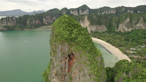 aerial vista of tropical paradise at railay beach over the limestone mountains with turquoise lagoons in thailand