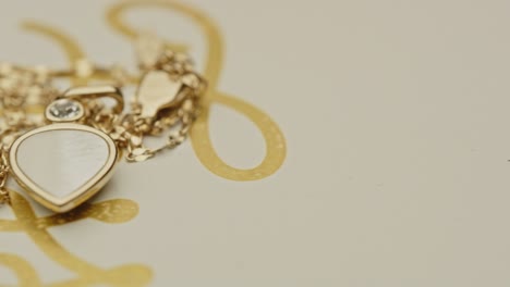 macro pan of beautiful of golden necklace