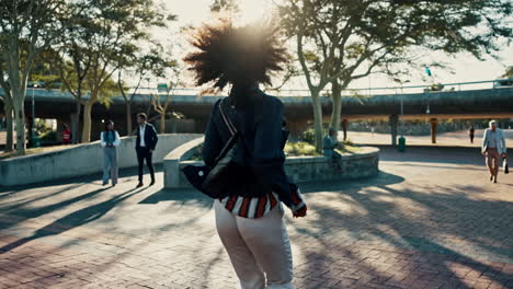 people walking in an urban park