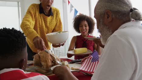 multi-generation family having celebration meal