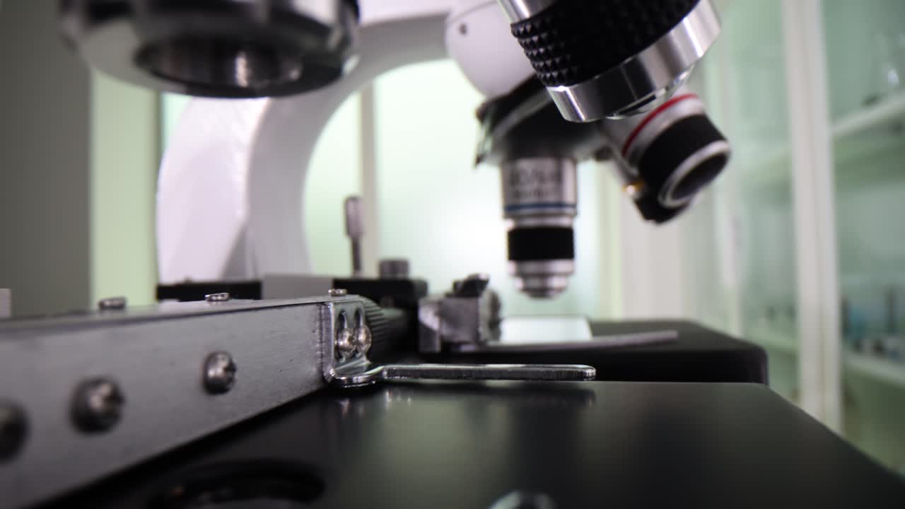 Close-up View of a Scientific Microscope in a Laboratory