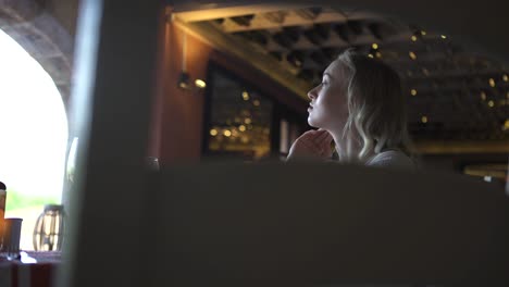 woman sitting in restaurant