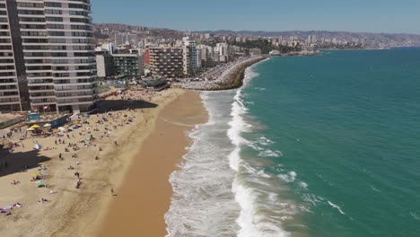 aerial view of waves breaking along acapulco beach in viña del mar