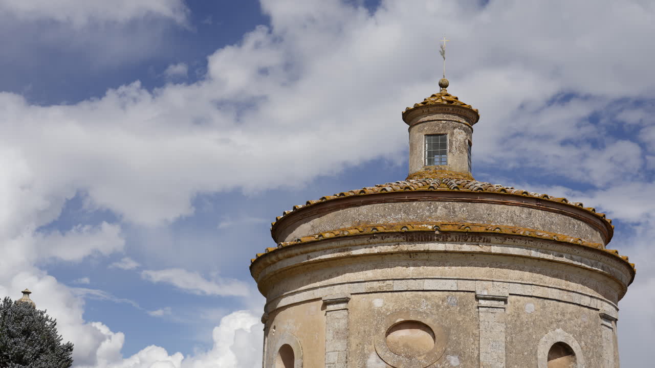 Old Stone Tower against a Cloudy Sky