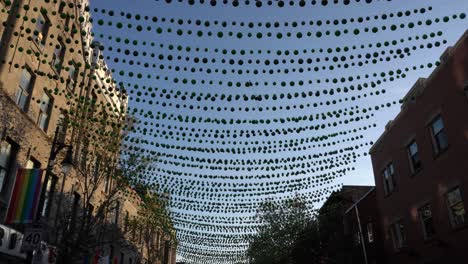 a cool perspective of decorations in the gay pride village in montreal