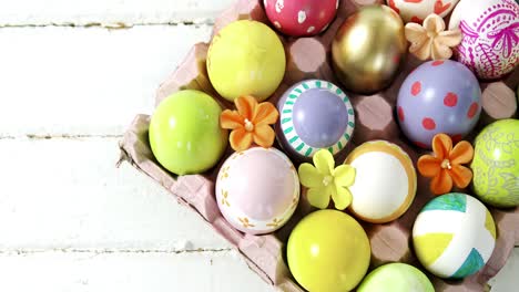 painted easter eggs in the nest