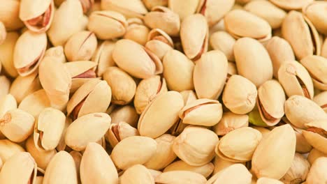 looped rotating pistachios full frame close-up background